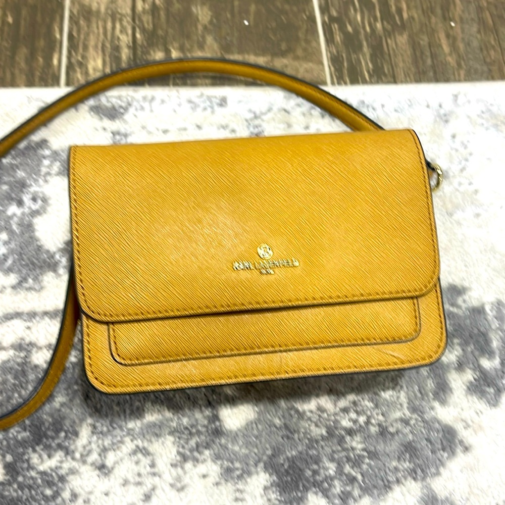 Mini purse over the shoulder by Karl Lagerfeld.
